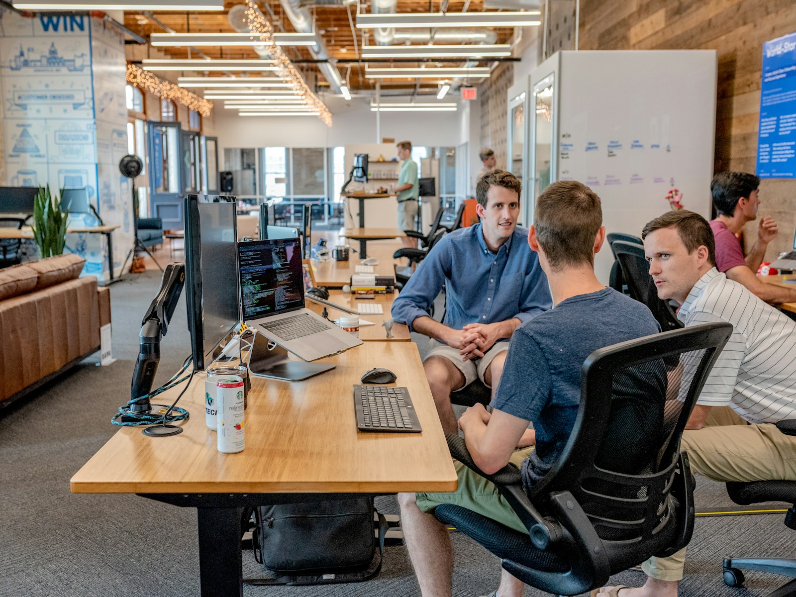 Business team reviewing plans together around a table